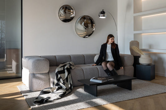 Wohnlandschaft für das Wohnzimmer mit hoher oder niedriger Rückenlehne?